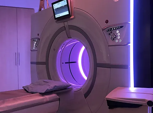 Medical imaging scanner installed in a clinical suite
