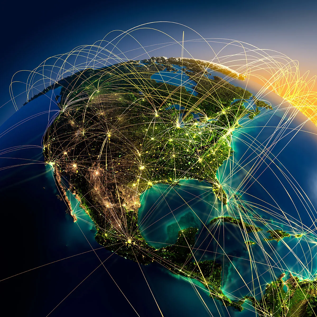 Global logistics network drawn across a lit map of North America